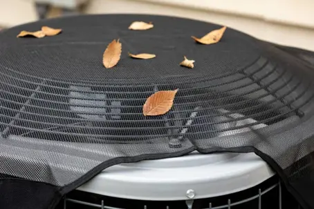 leaves on HVAC unit